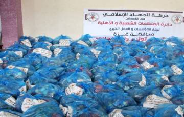 "العمل الخيري" توزع 800 طرد غذائي على الأسر المستورة بغزة