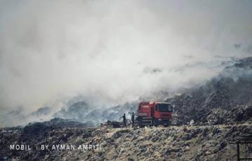 بلدية غزة: الدخان المُنبعث من مكب النفايات يخف تدريجياً بعد السيطرة على الحريق   
